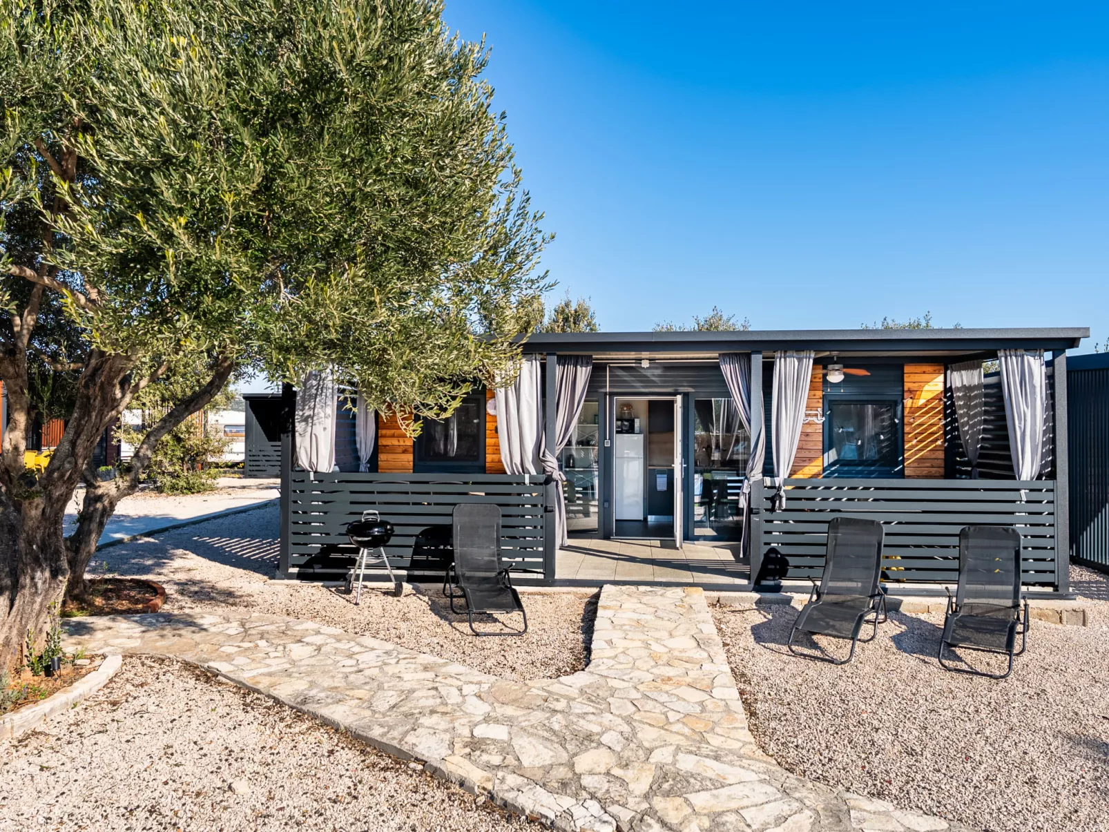 Maslina Delux - Buiten