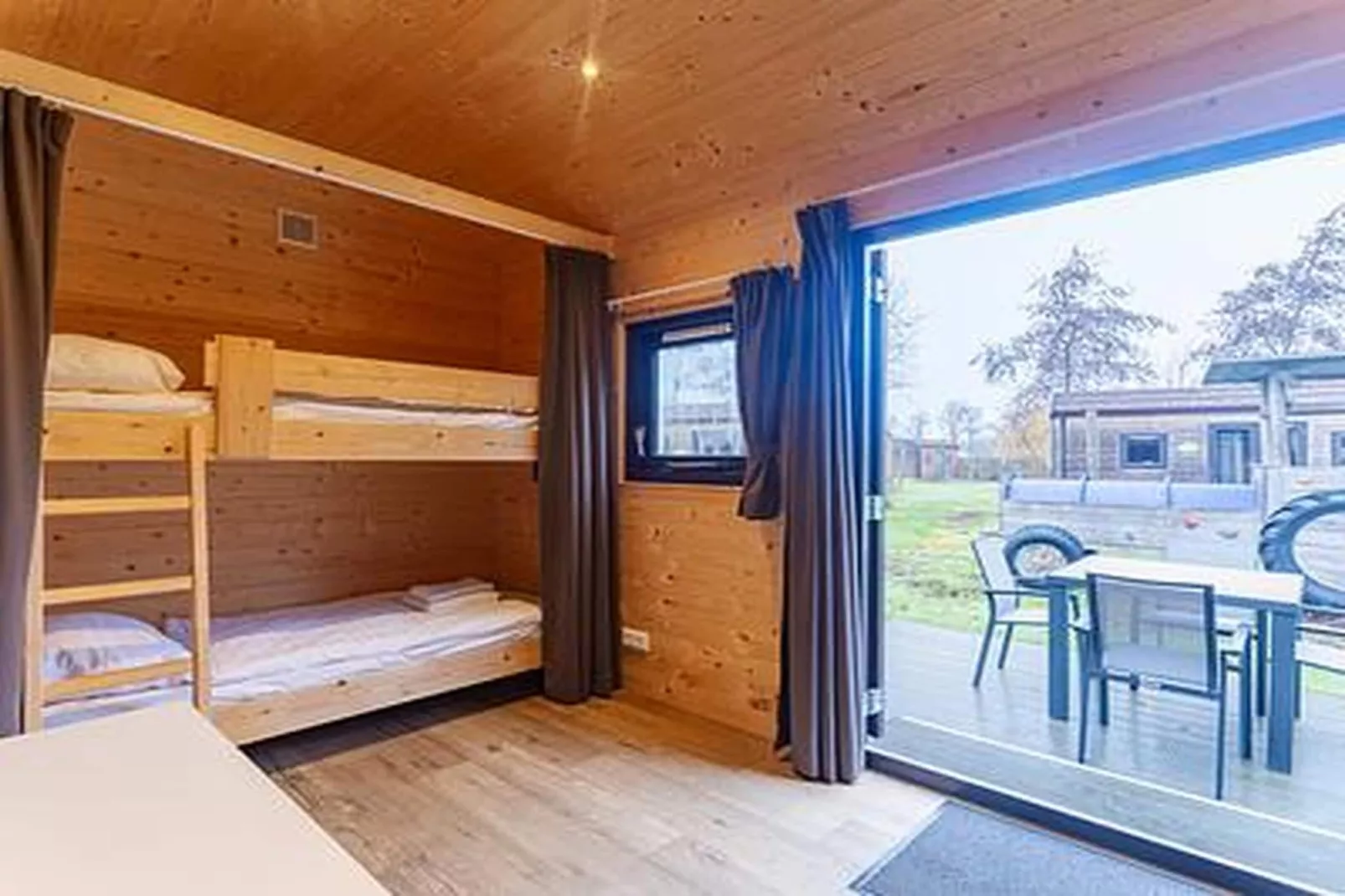 Duinhoeve Duinlodges 4pers (huisdiervriendelijk) - Terrasbalkon