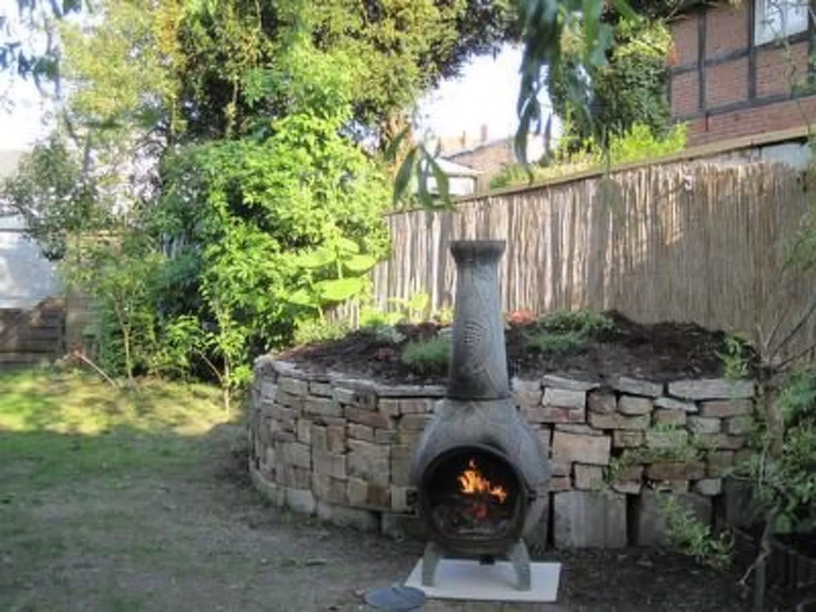 Charlotte mit Garten - Buiten