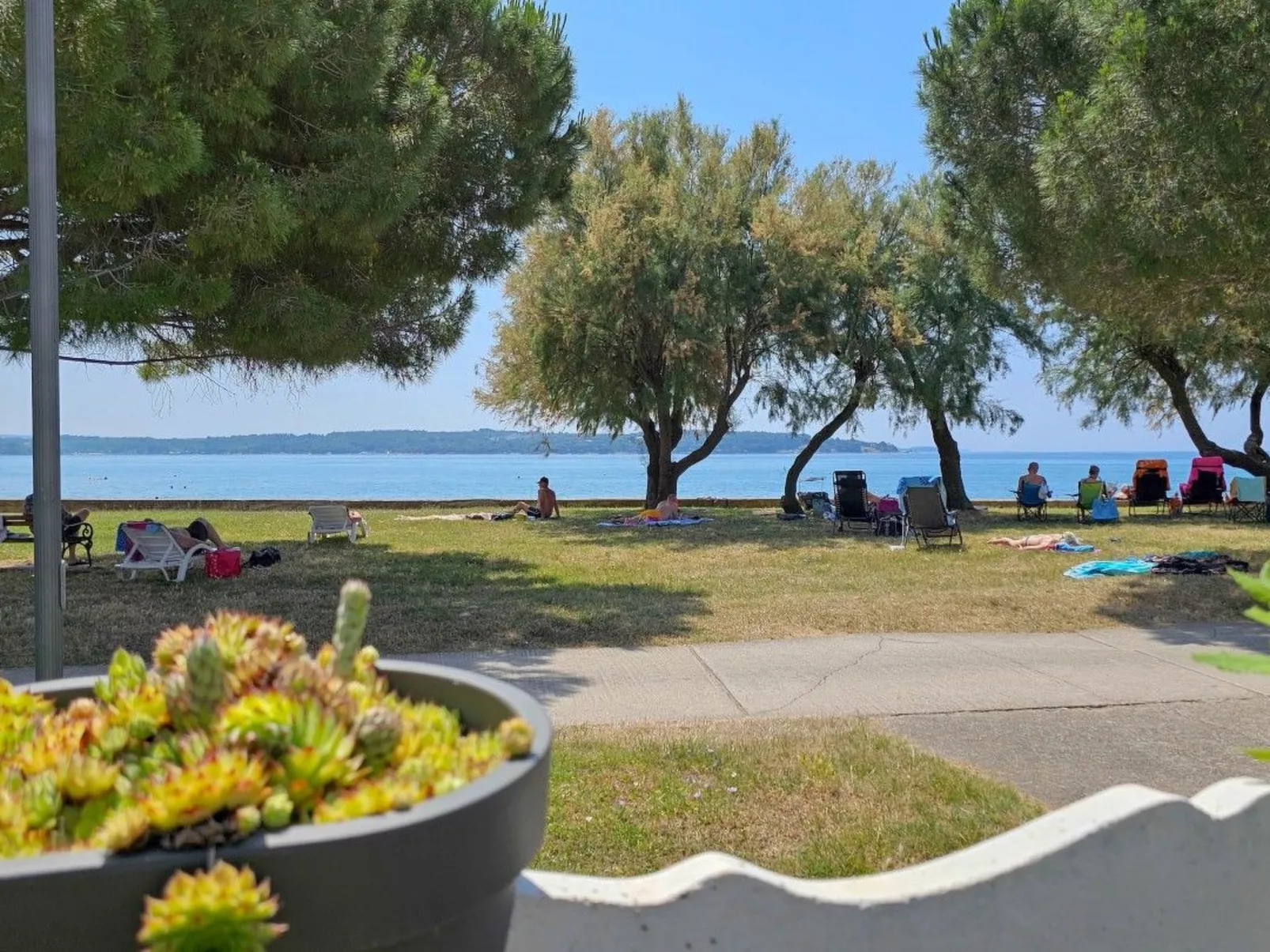 Wohnung "Pintar 1" mit Blick auf das Wasser - Buiten