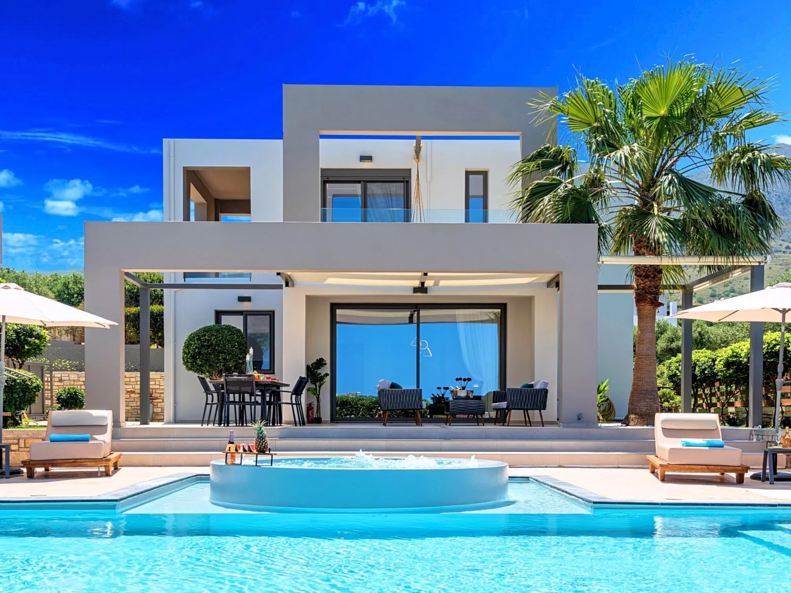 Villa "Minoas Grand" mit Blick auf das Wasser - Buiten