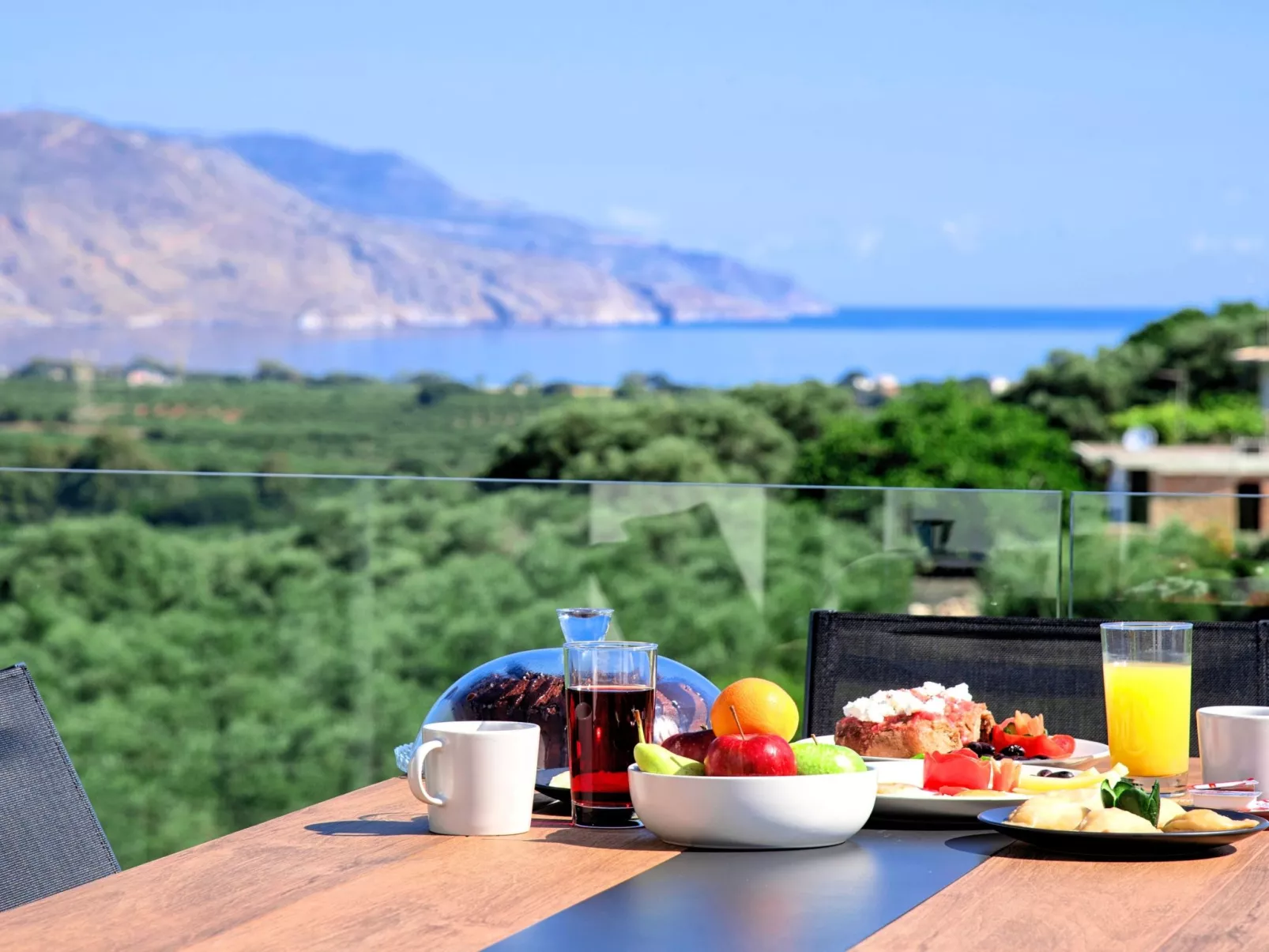 Villa "Minoas Grand" mit Blick auf das Wasser - Buiten