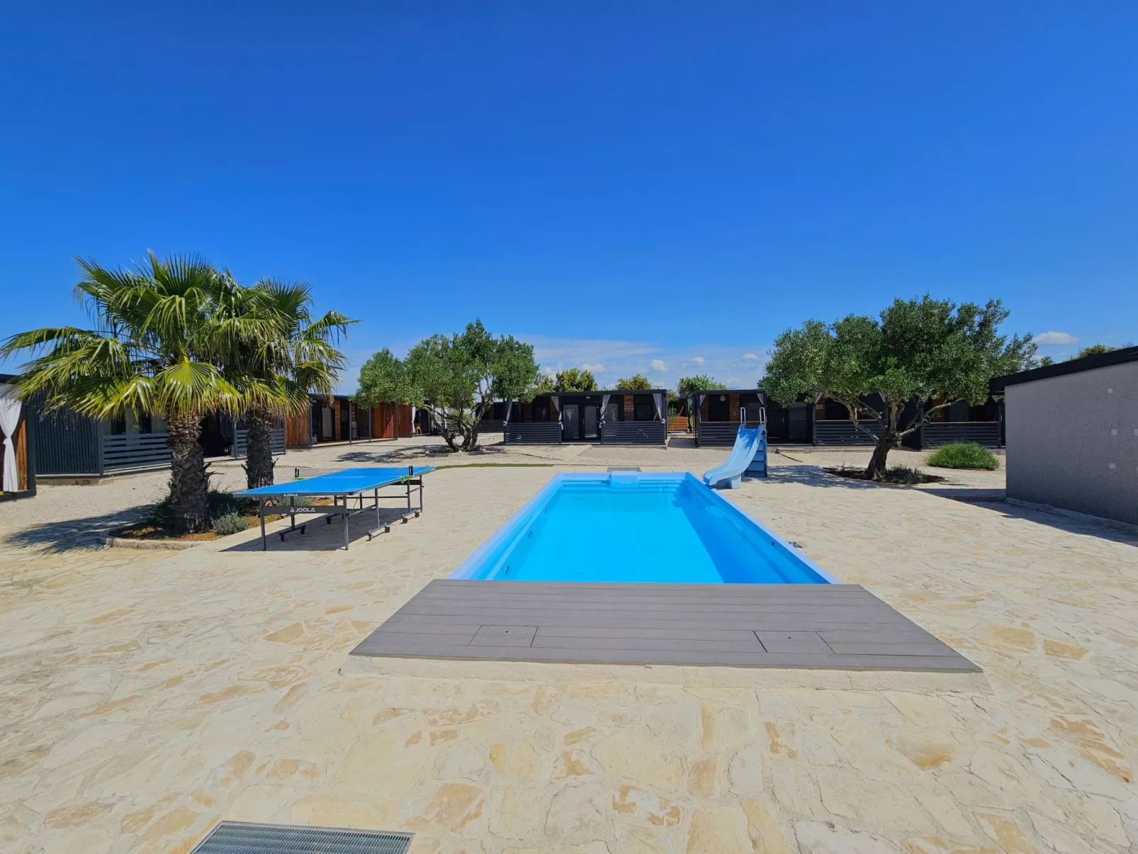 Maslina Delux - Buiten