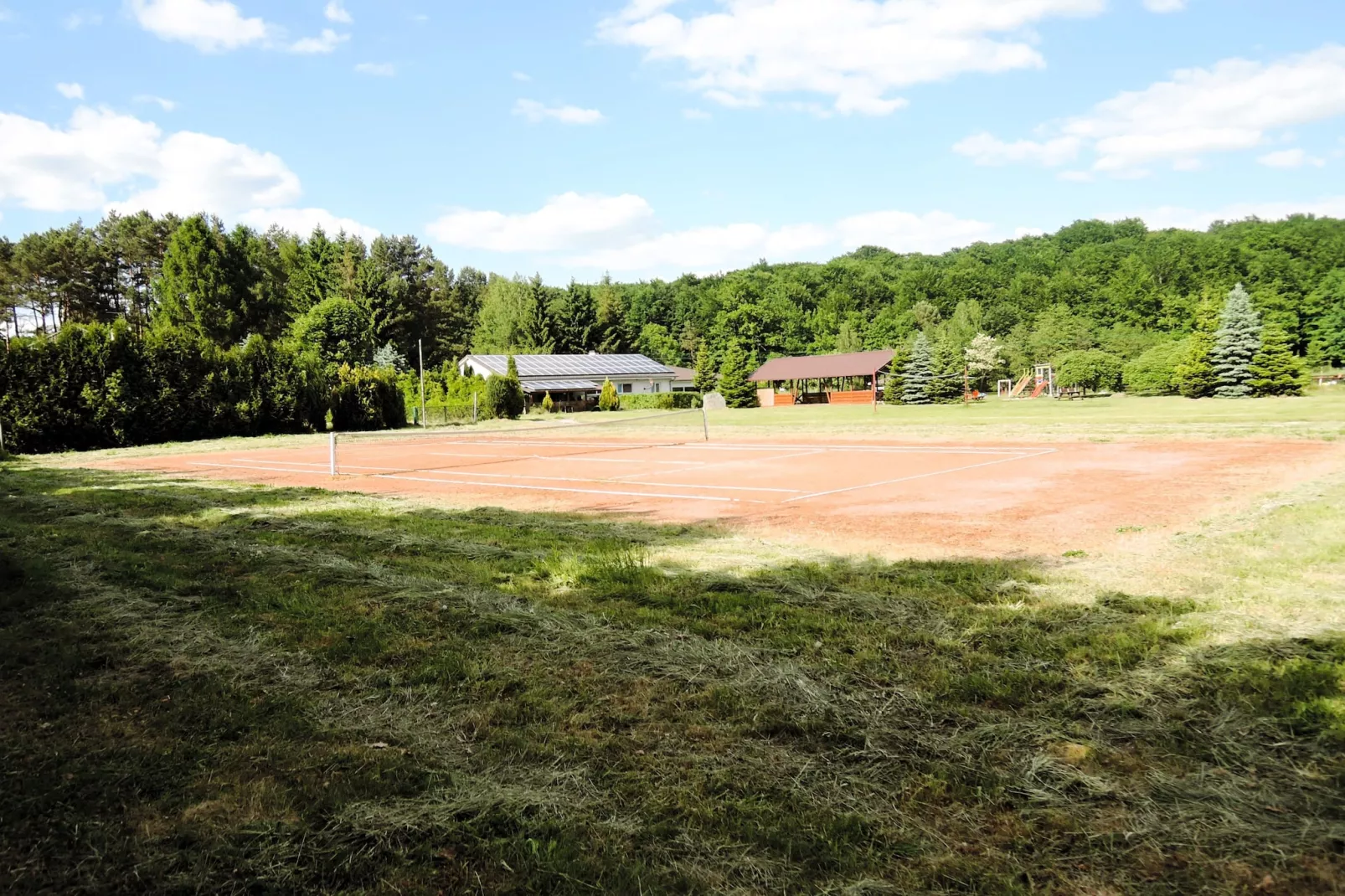 Holiday complex in Jezierzyce by Szczecin at the lake 30 qm for 4 persons Typ C Zolty - Tuinen zomer