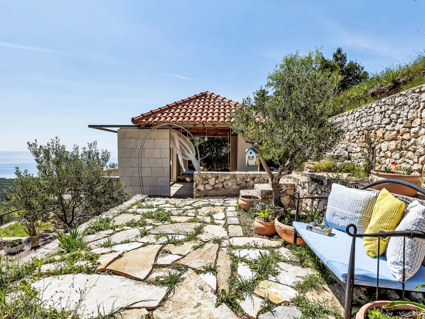 "Villa Rita" mit Blick auf das Wasser - Buiten