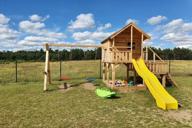 Dom wakacyjny bliźniak Wdzydze 1 - Tuinen zomer