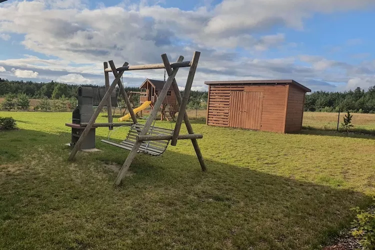 Dom wakacyjny bliźniak Wdzydze 1 - Tuinen zomer