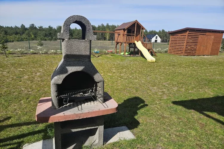 Dom wakacyjny bliźniak Wdzydze 2 - Tuinen zomer