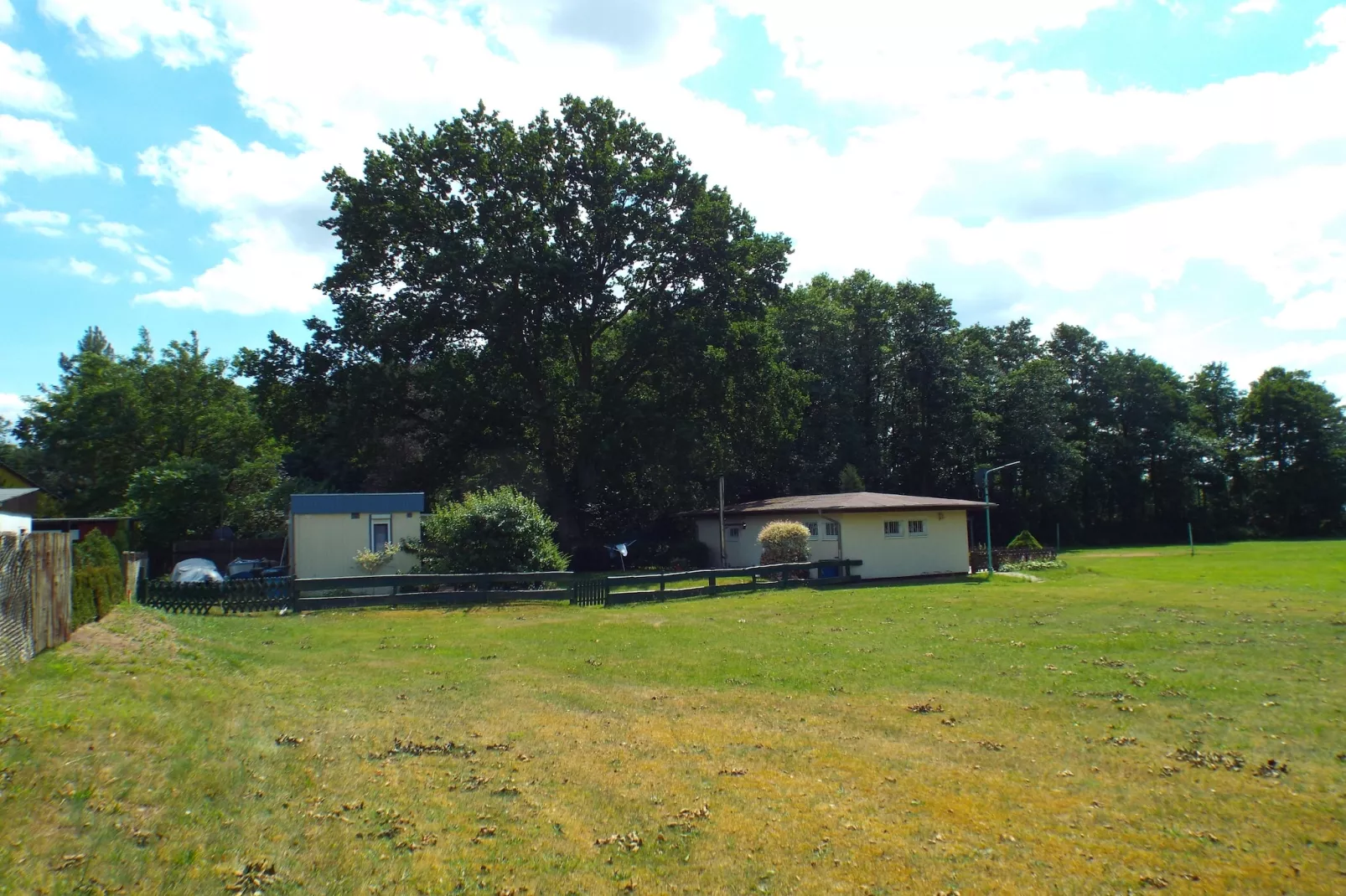 Bungalow Schlowe Am See 4 P - Buitenkant zomer