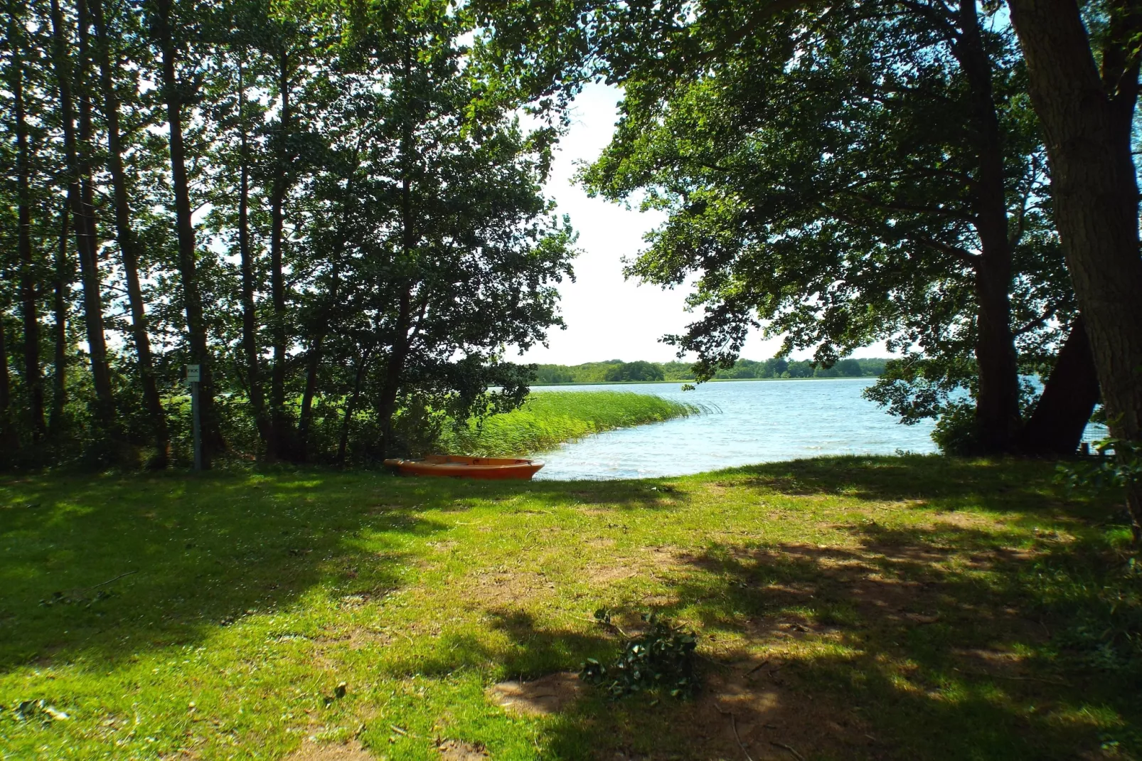 Bungalow Schlowe Am See 4 P - Uitzicht zomer