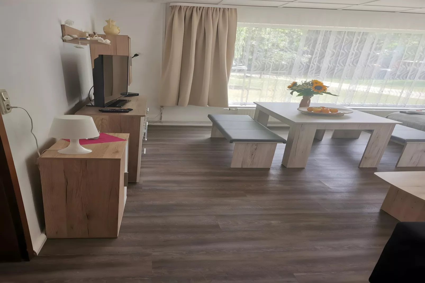 Ferienwohnung am Goldberger See - Woonkamer