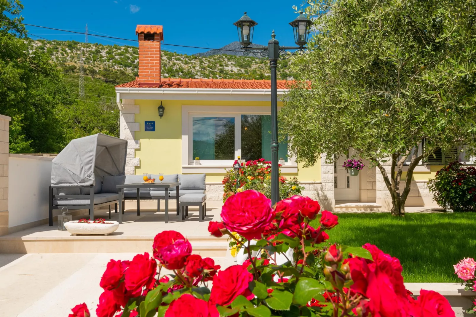 Holiday Home Maslina - Buitenkant zomer