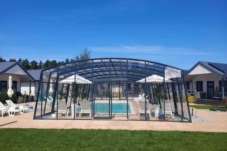 Domki wakacyjne przy stawie Jarosławiec - Zwembad