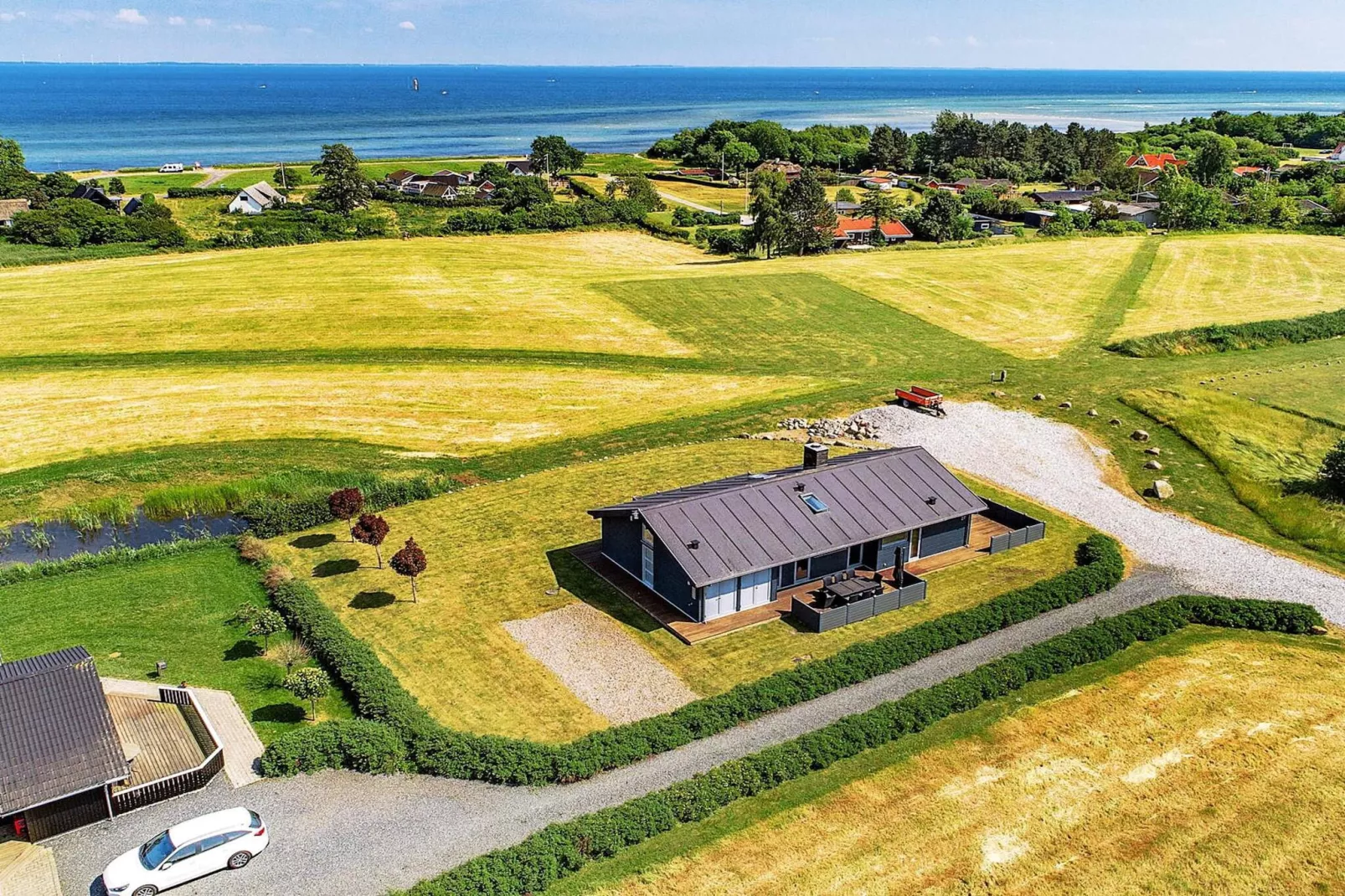 Vakantiehuis aan de kust met spa en sauna - Buitenlucht