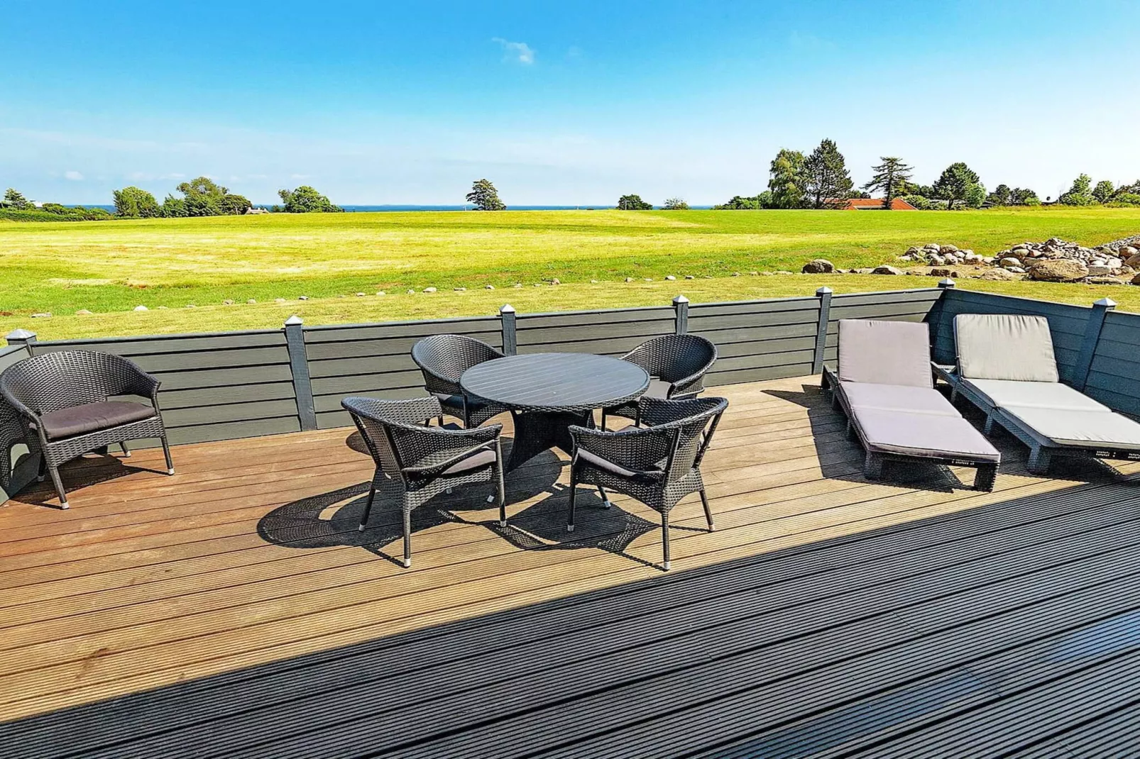 Vakantiehuis aan de kust met spa en sauna - Buitenlucht