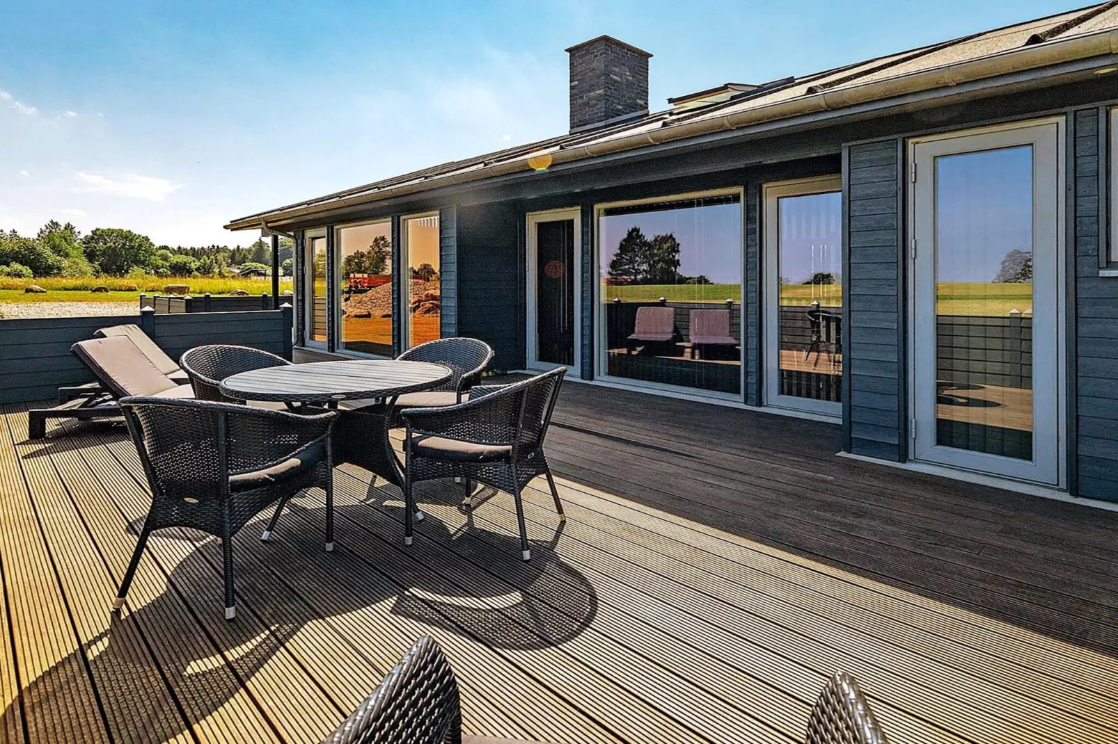 Vakantiehuis aan de kust met spa en sauna - Buitenlucht