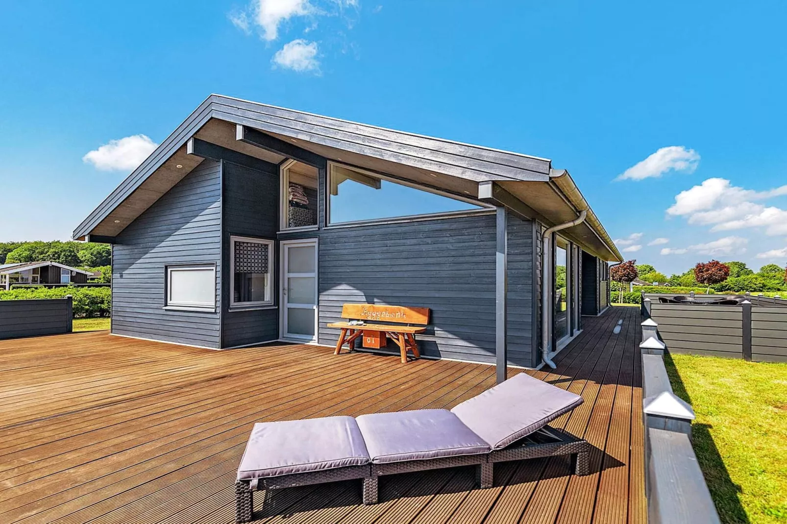 Vakantiehuis aan de kust met spa en sauna - Buitenlucht