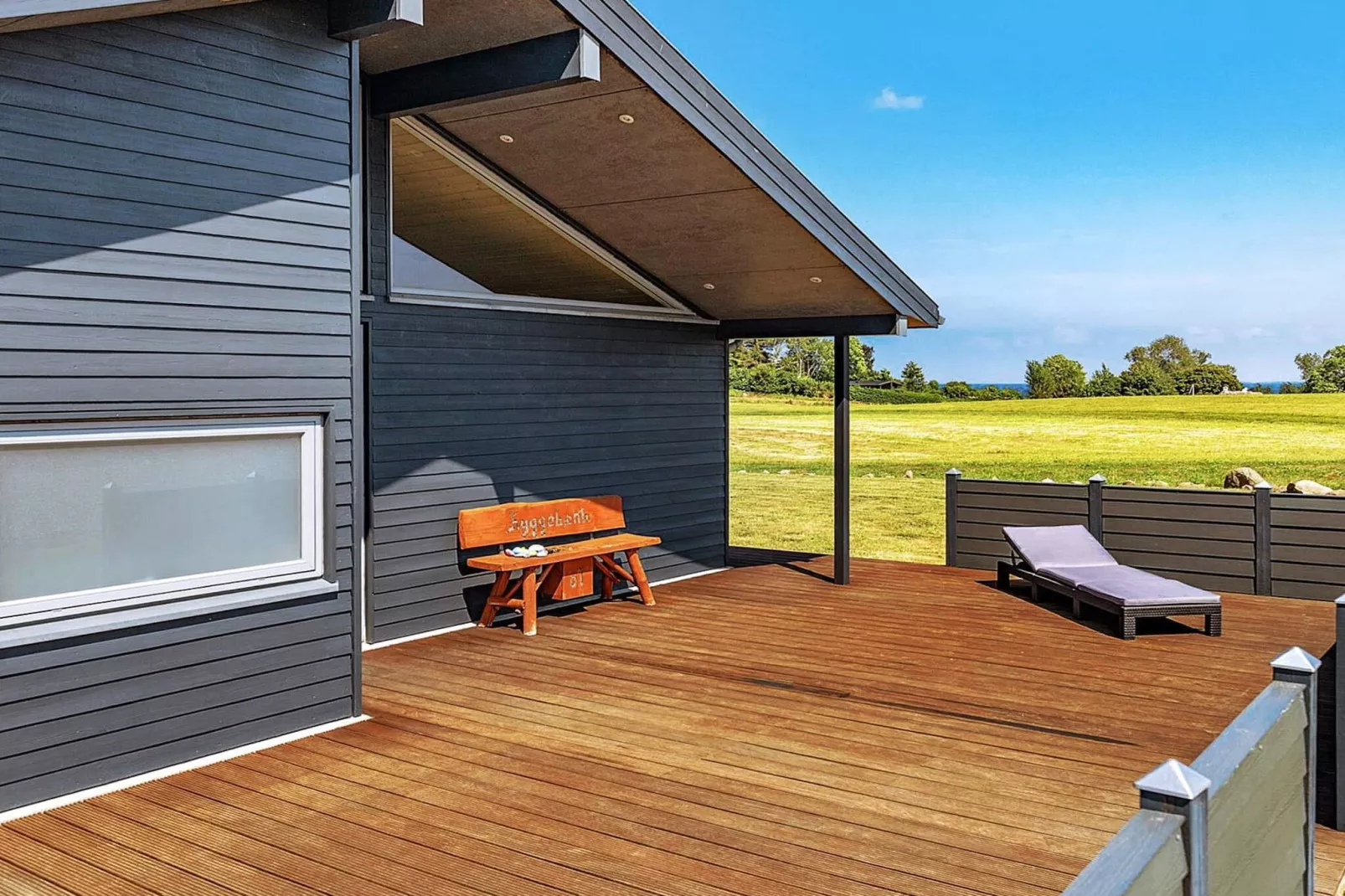 Vakantiehuis aan de kust met spa en sauna - Buitenlucht