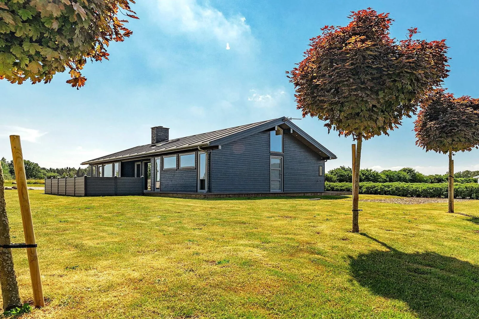 Vakantiehuis aan de kust met spa en sauna - Buitenlucht