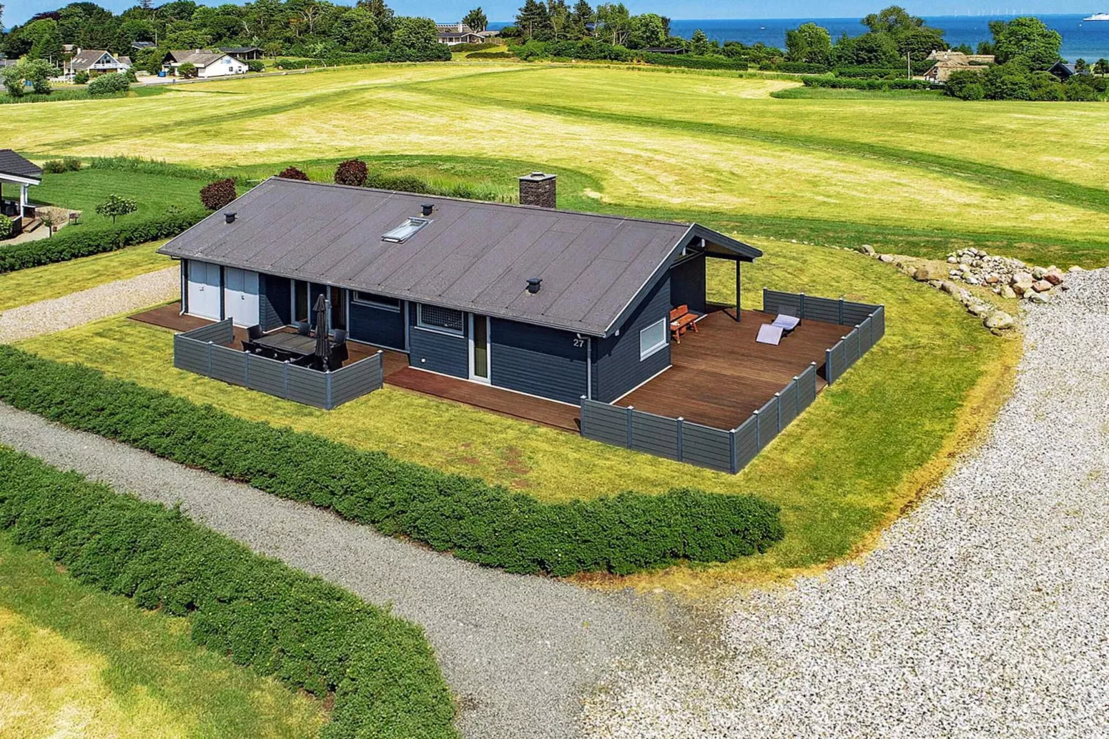 Vakantiehuis aan de kust met spa en sauna - Buitenlucht