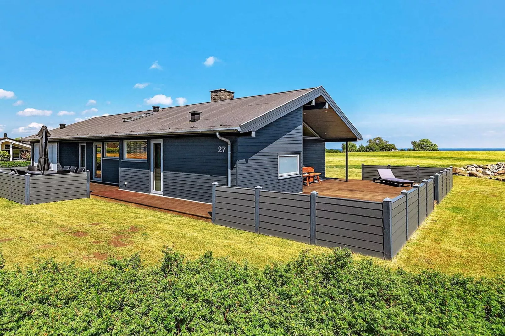 Vakantiehuis aan de kust met spa en sauna - Buitenlucht