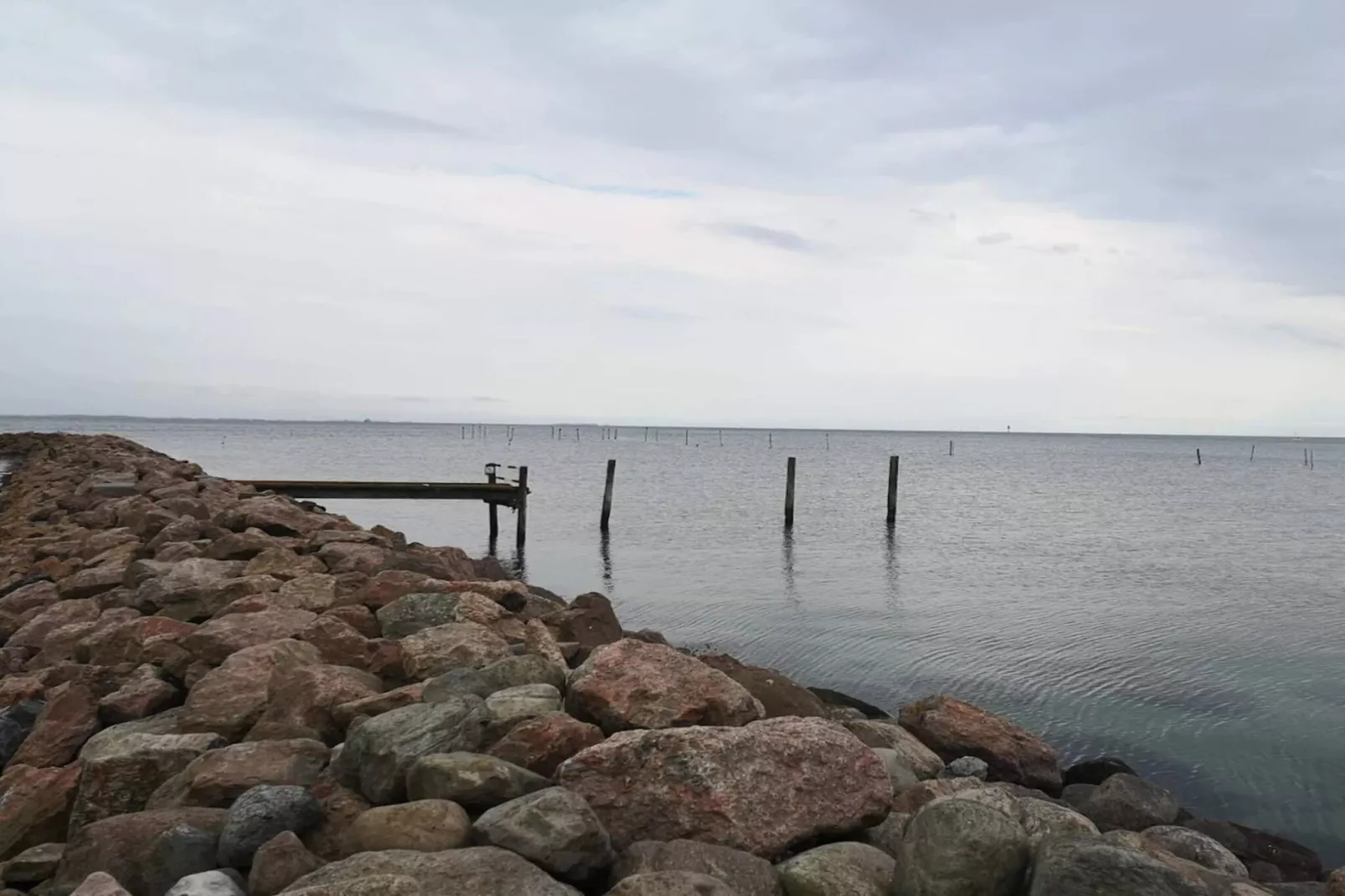 Vakantiehuis aan de kust met spa en sauna - Waterzicht
