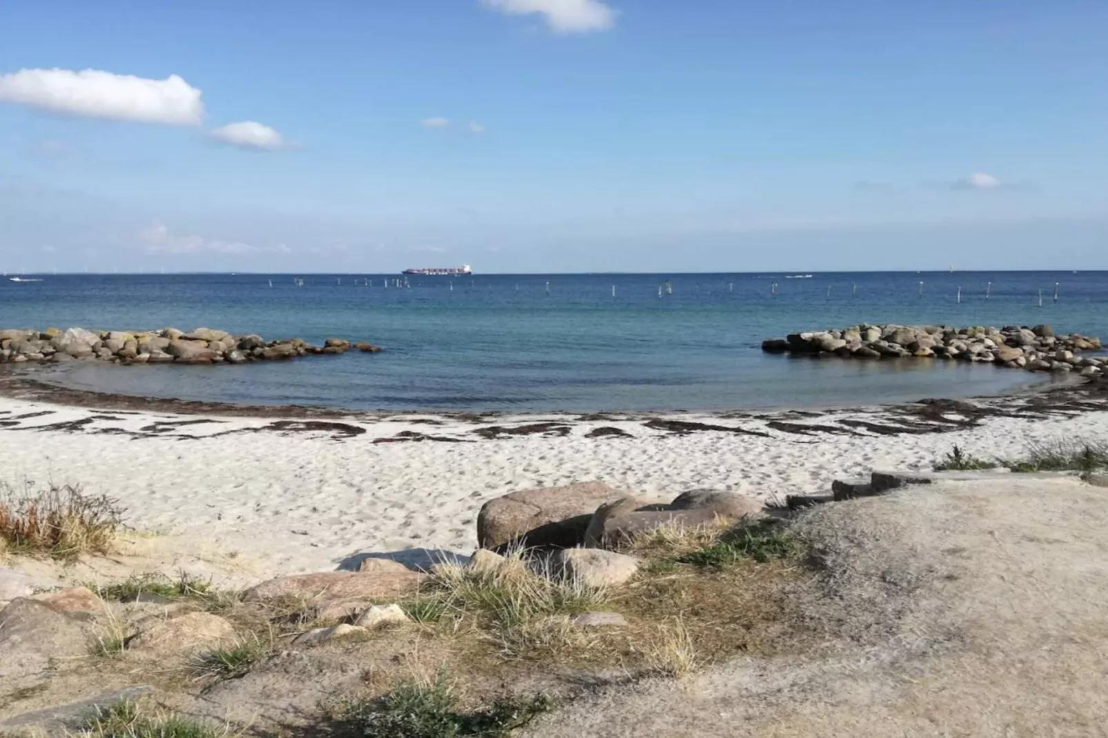 Vakantiehuis aan de kust met spa en sauna - Waterzicht