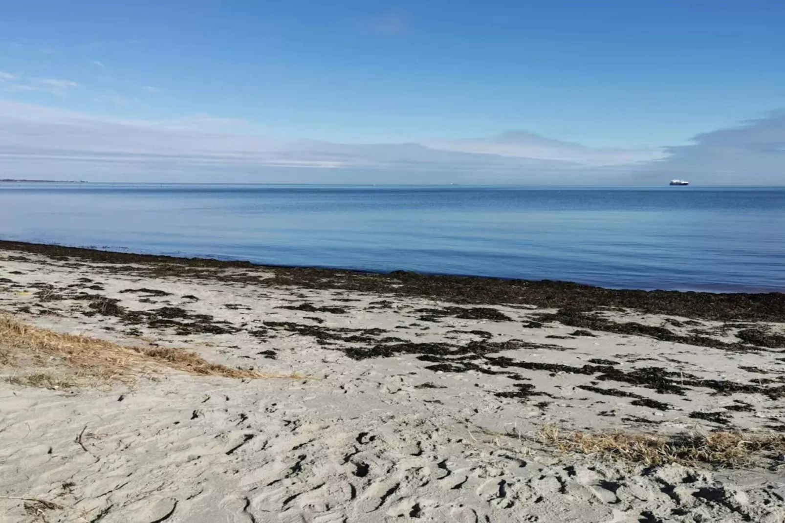 Vakantiehuis aan de kust met spa en sauna - Waterzicht