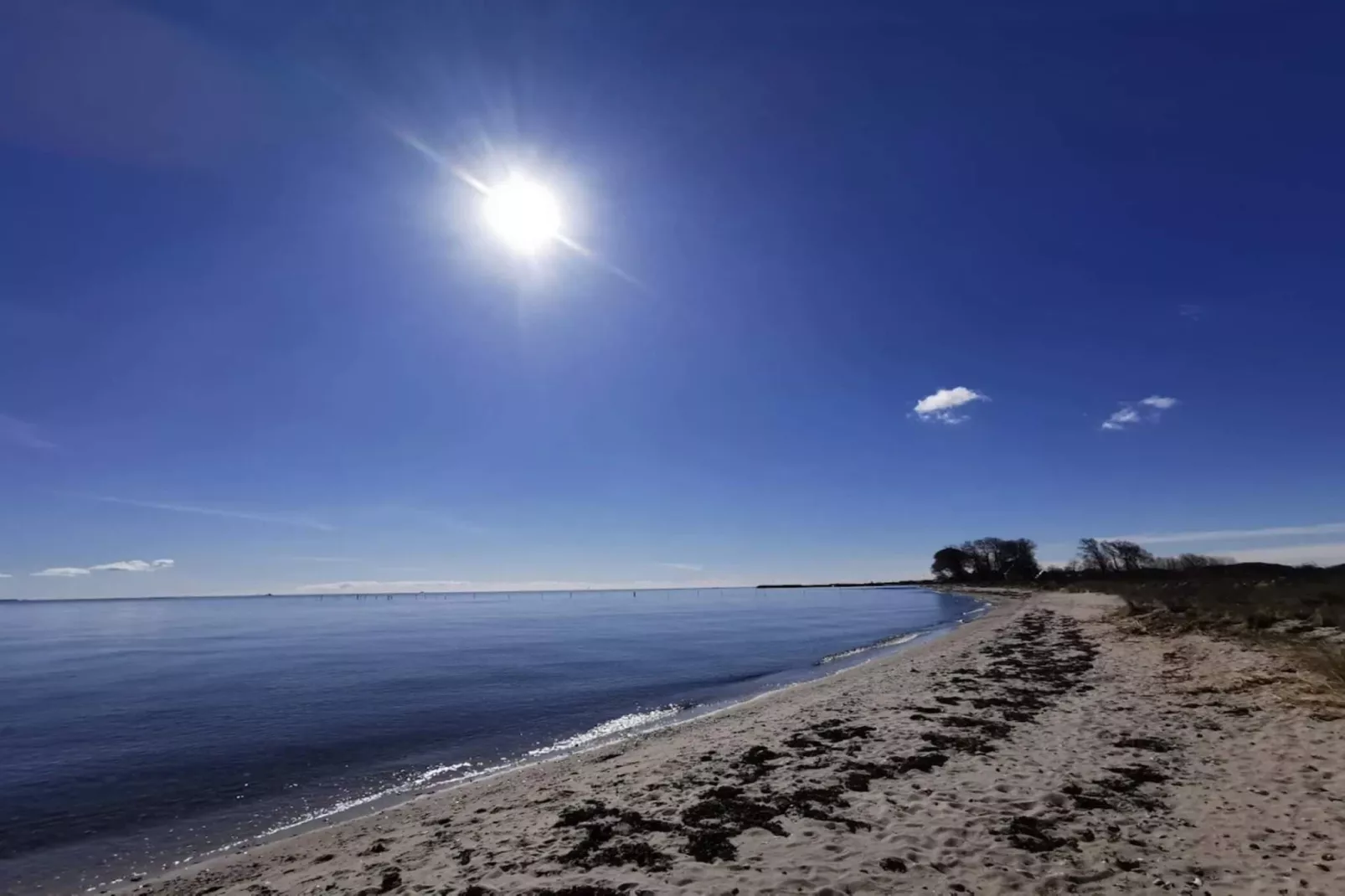 Vakantiehuis aan de kust met spa en sauna - Waterzicht