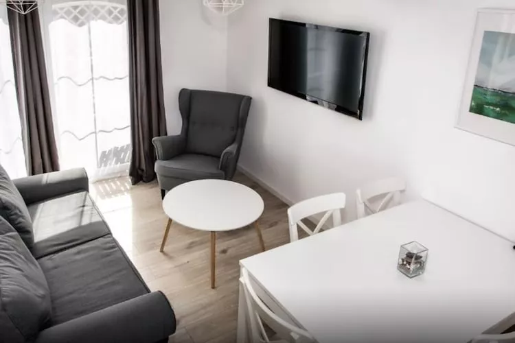 Domy wakacyjne i apartamenty w Niechorzu - Woonkamer