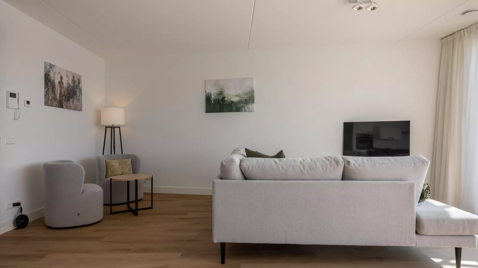 Panorama Appartement Kortgene - Woonkamer