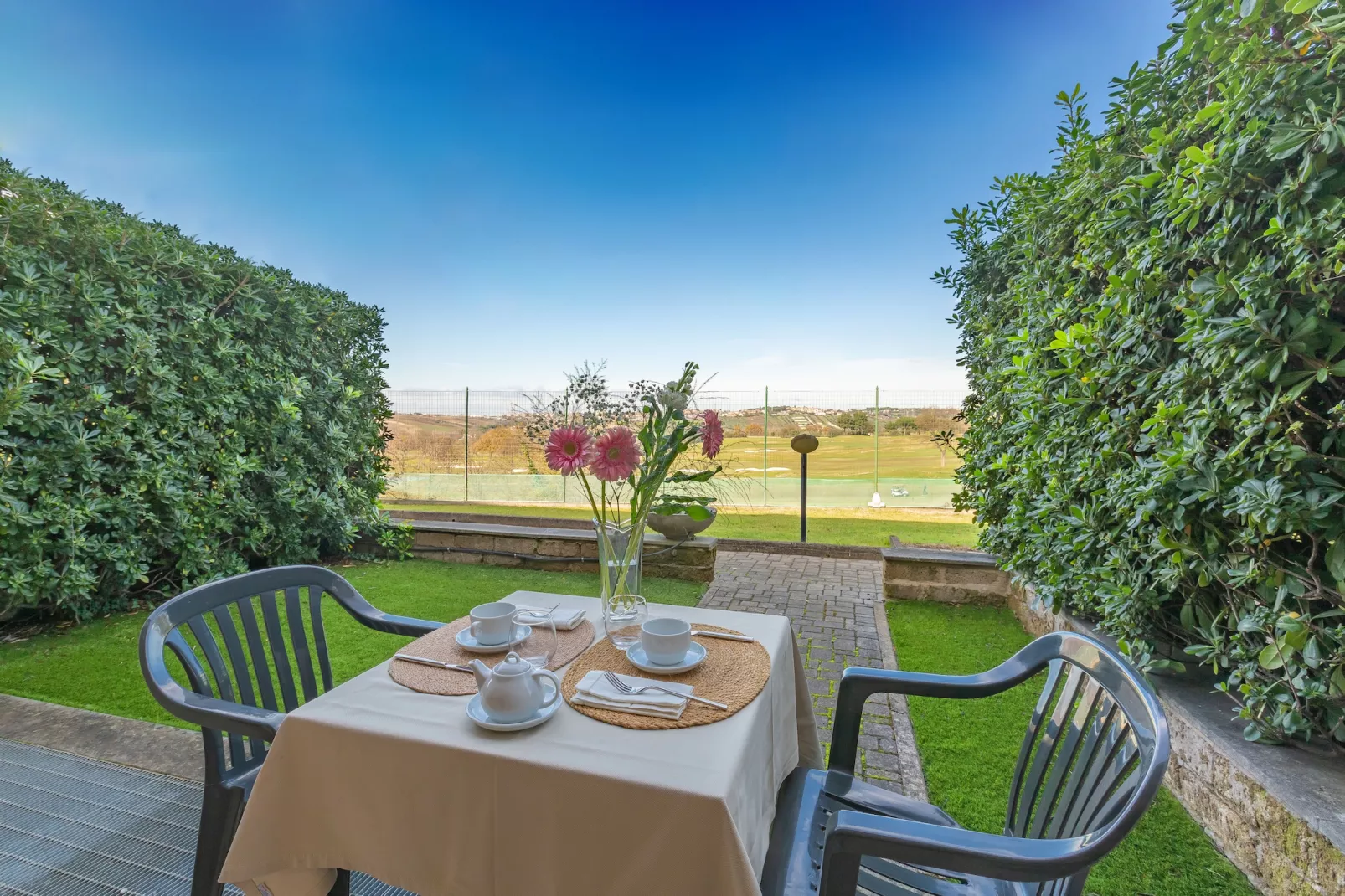 Bilocale vista giardino 105- 2 pax - Terrasbalkon