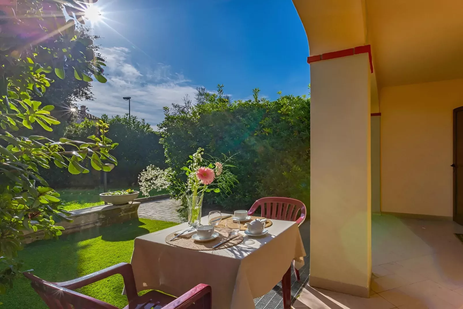 Bilocale vista giardino 105- 3 pax - Terrasbalkon