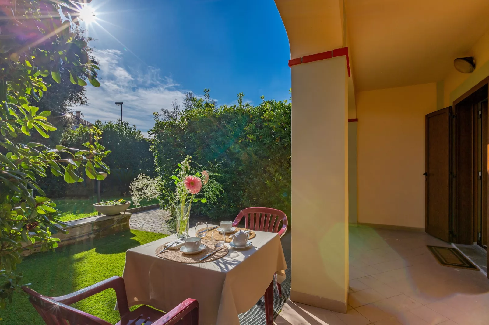 Bilocale vista giardino 105- 2 pax - Terrasbalkon