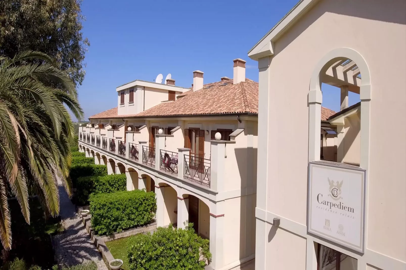 Bilocale vista giardino 105- 3 pax - Buitenkant zomer