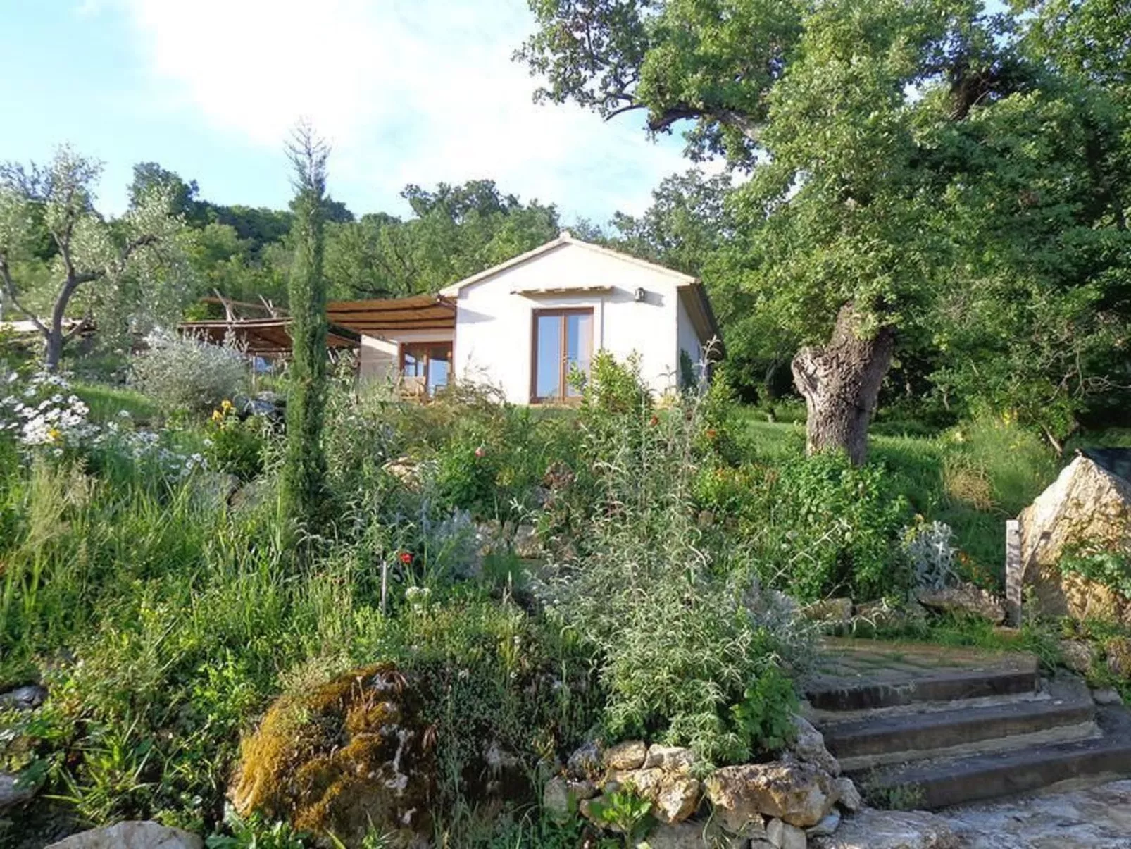 Freistehendes Landhaus mit Gemeinschaftspool - Buiten