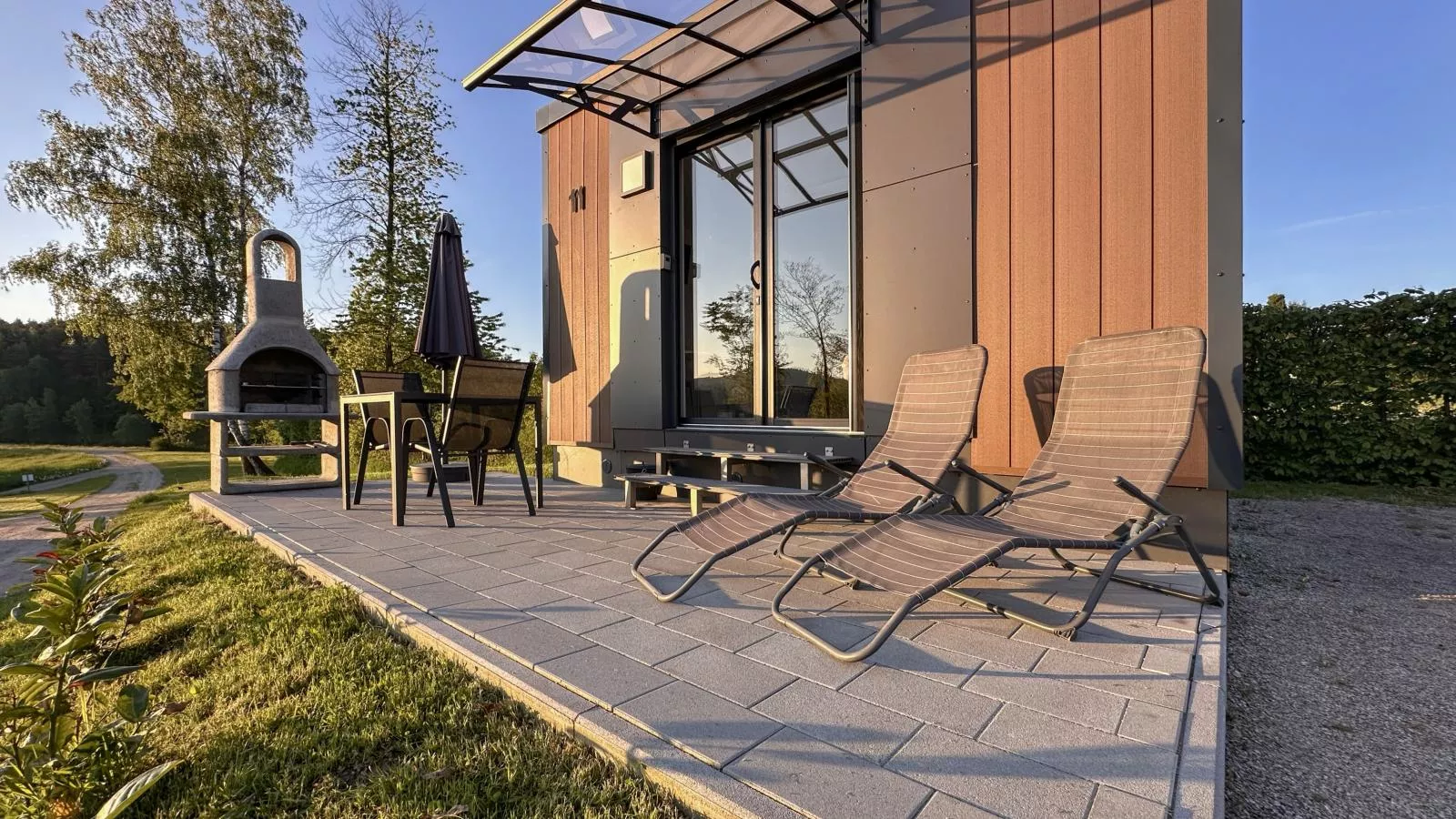 Feriendorf Seeblick - Tiny Nr 11 - Buitenkant zomer