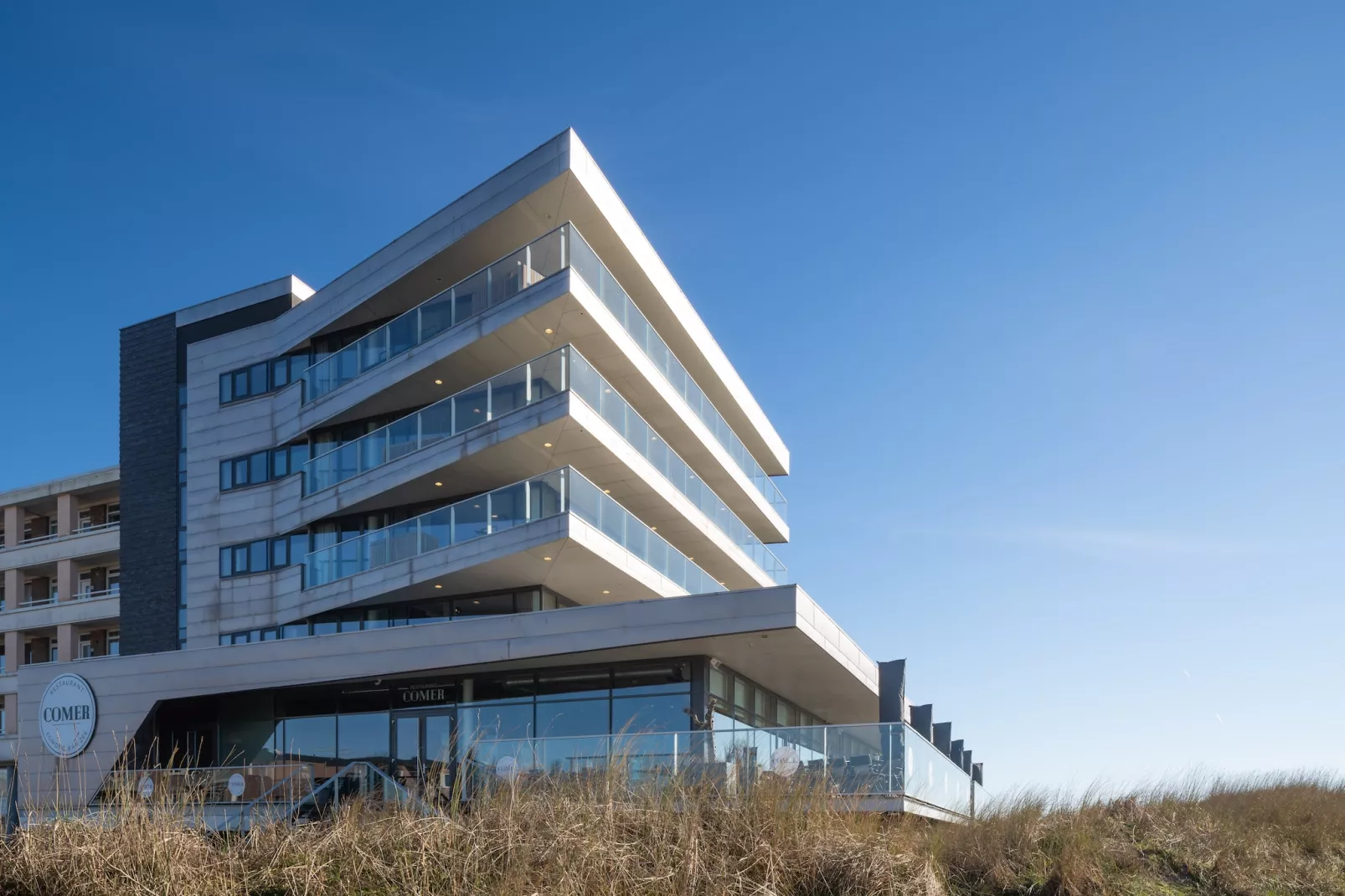 Droomsuites Egmond aan Zee - 8 person apartment - Buitenkant zomer