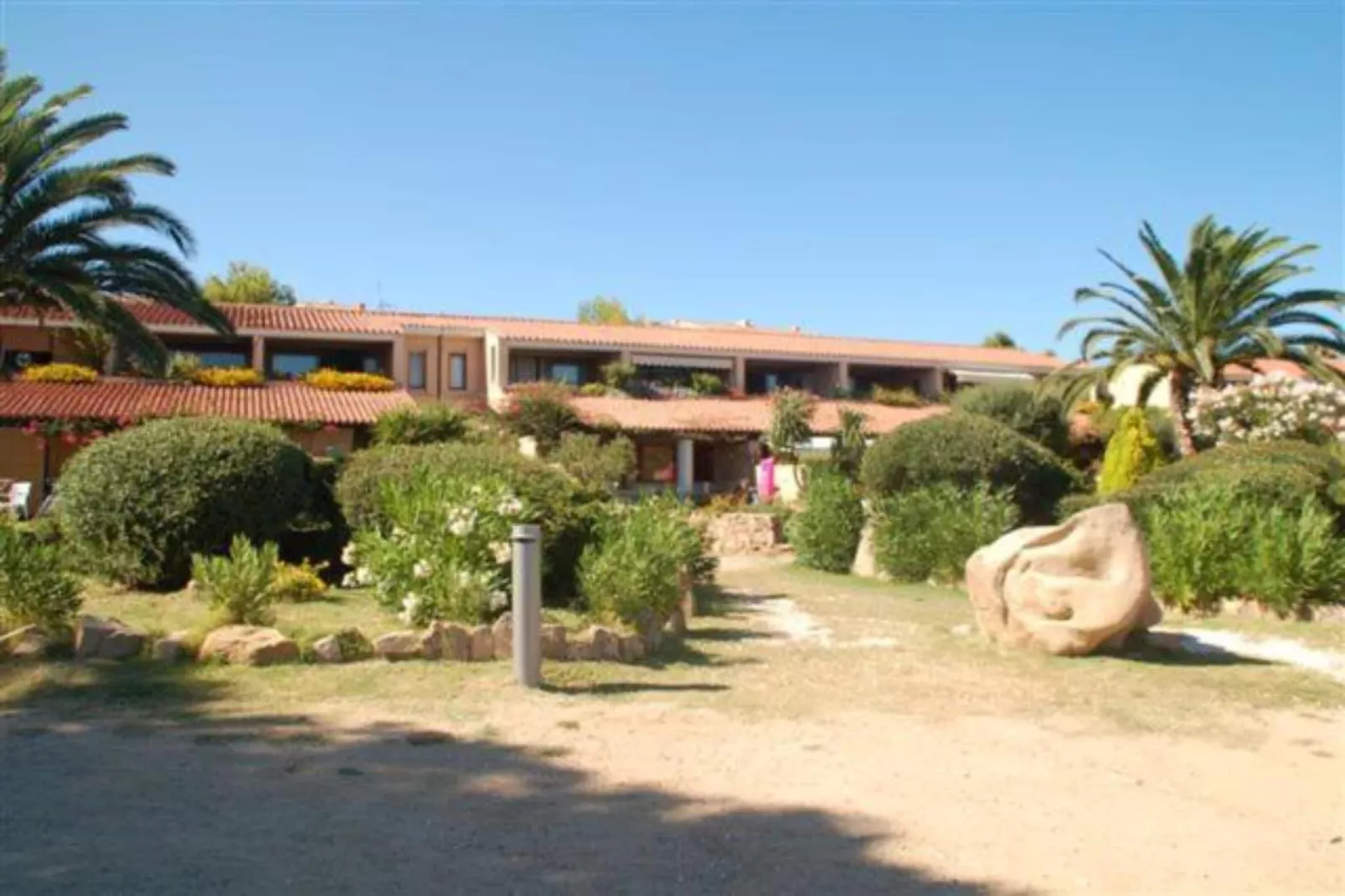 Residence Porto Coda Cavallo - APARTMENT 2 BEDROOM - Buitenkant zomer