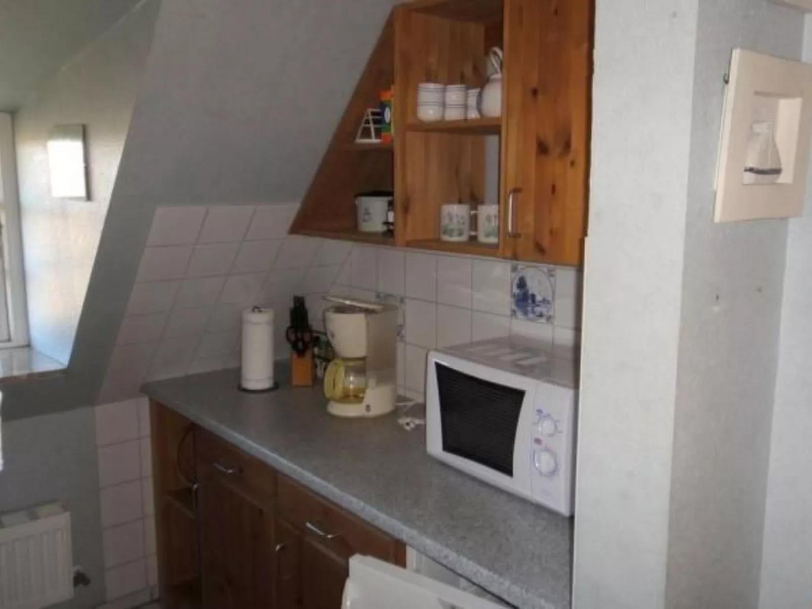 Wohnung in einem reetgedeckten Friesenhaus aus dem Jahr 1860 - Binnen