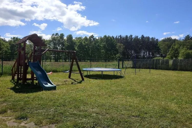 Dom wakacyjny z Klimatem Smołdziński Las - Tuinen zomer