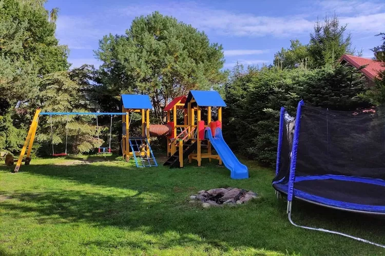 Domek wakacyjny z 2 sypialniami na piętrze w Kopalinie - Tuinen zomer