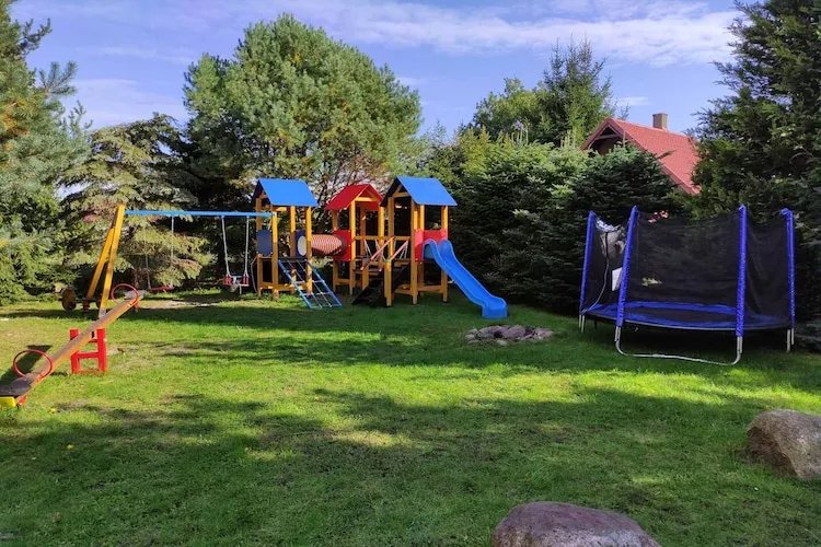 Całoroczny dom wakacyjny w Kopalinie - Tuinen zomer