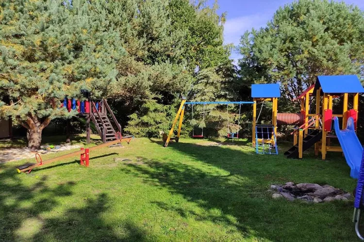 Całoroczny dom wakacyjny w Kopalinie - Tuinen zomer