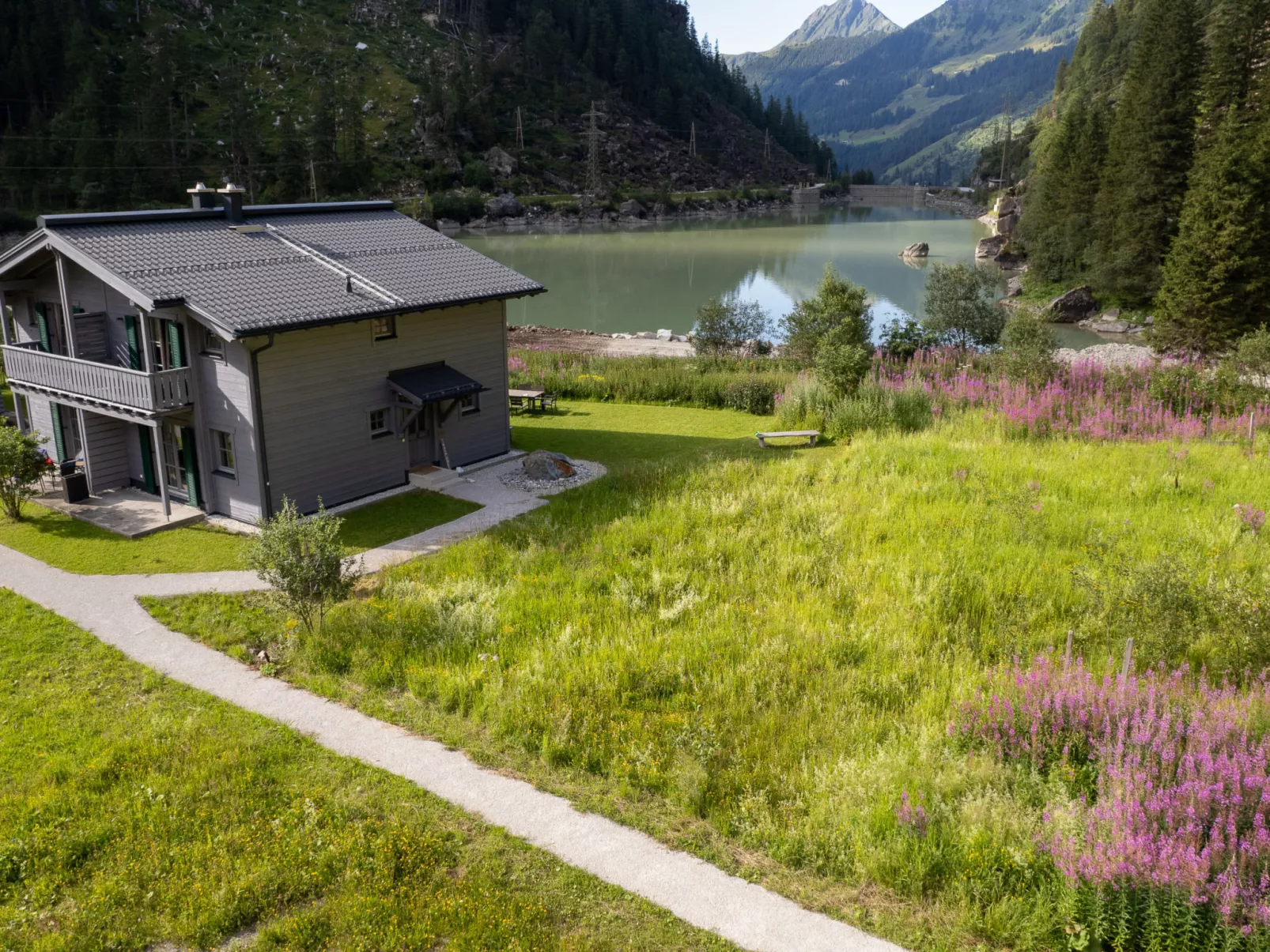 Lodge Seeblick 161 im Tauerndorf Enzingerboden - Buiten
