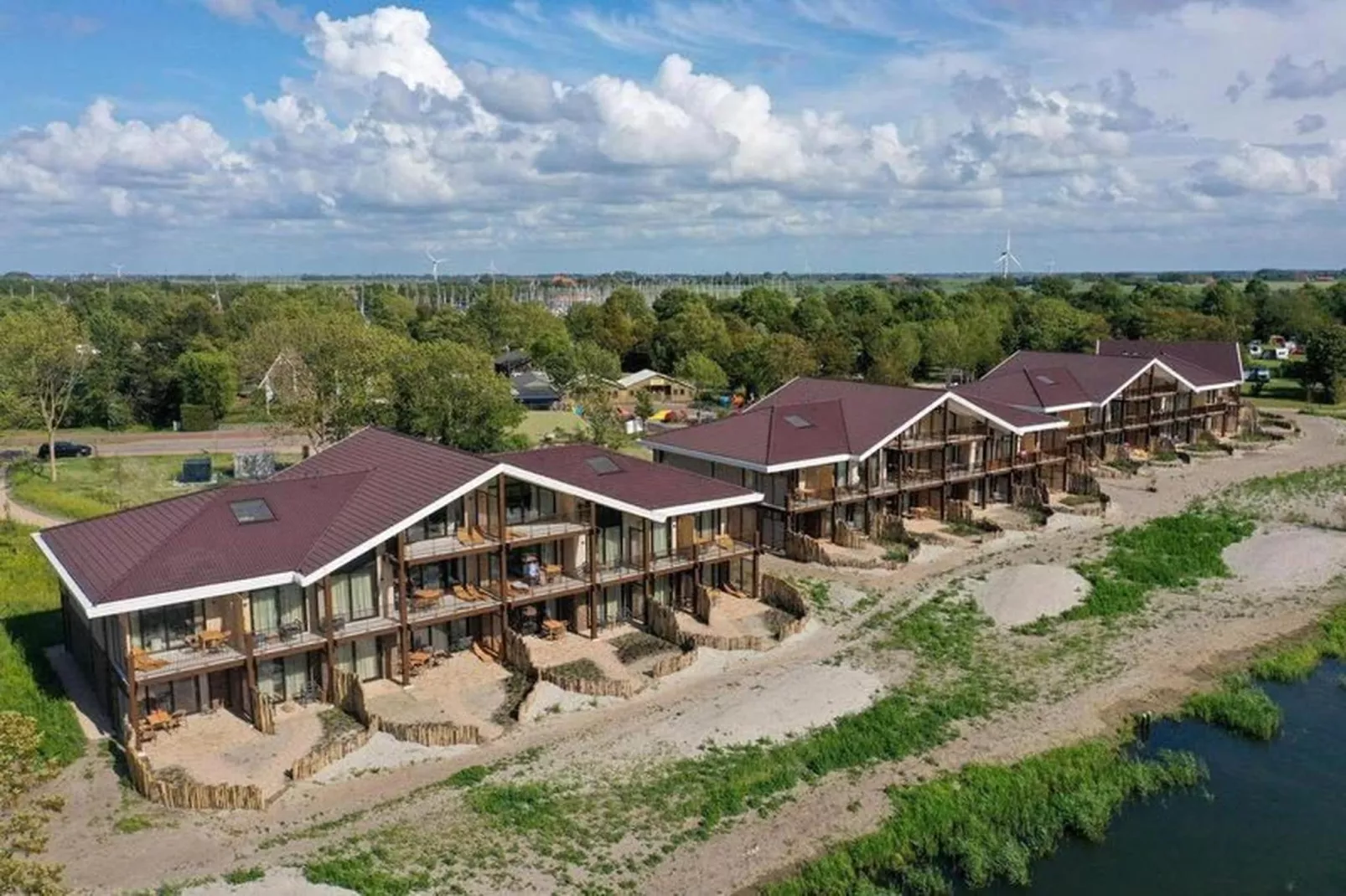 Luxury Beach Apartment | 4+2 Pers. - Buitenkant zomer