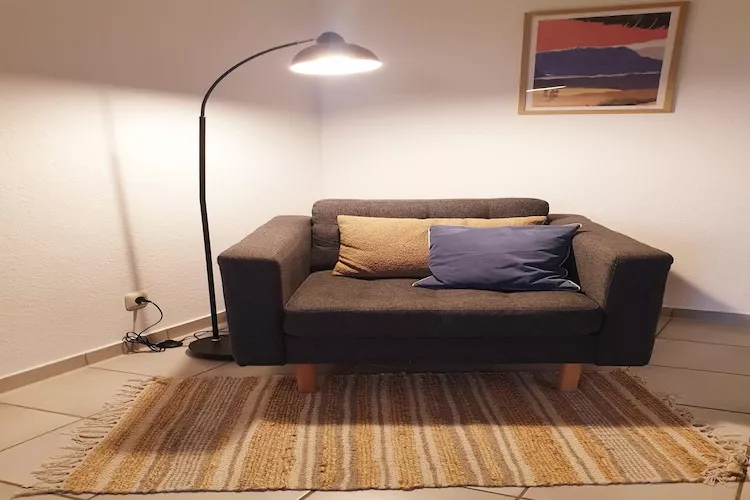 Ferienwohnung Terrasse und Aussicht - Woonkamer
