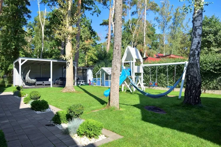 Piętrowe domki wakacyjne 3 plus 2 Pobierowo - Tuinen zomer