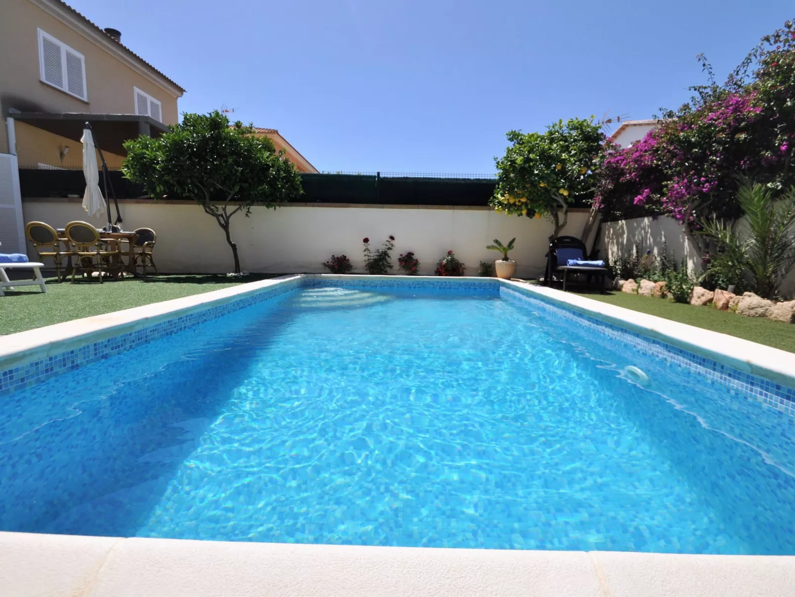 VILLA HUGO Casa en zona residencial tranquila Bahía Grande con Piscina Privada. - Buiten