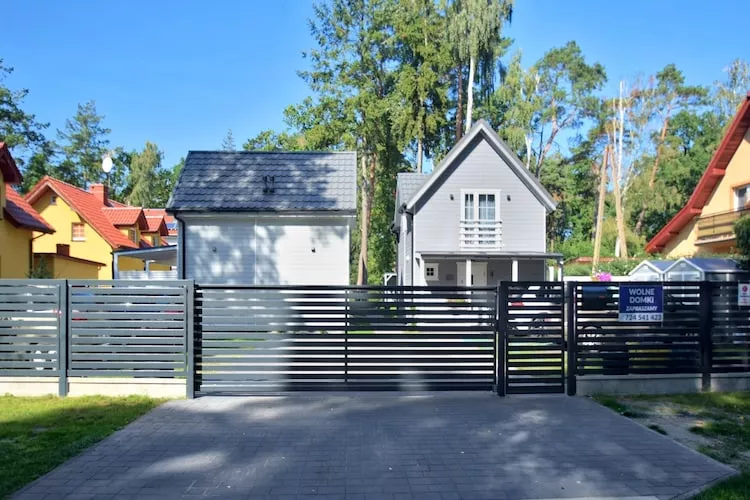 Piętrowe domki wakacyjne 3 plus 2 Pobierowo - Parkfaciliteiten